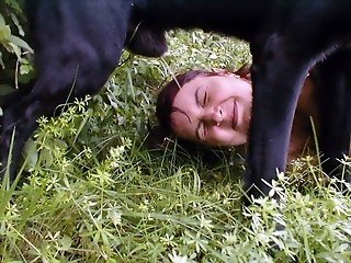 Strange zoophile loves when dogs piss right on her face